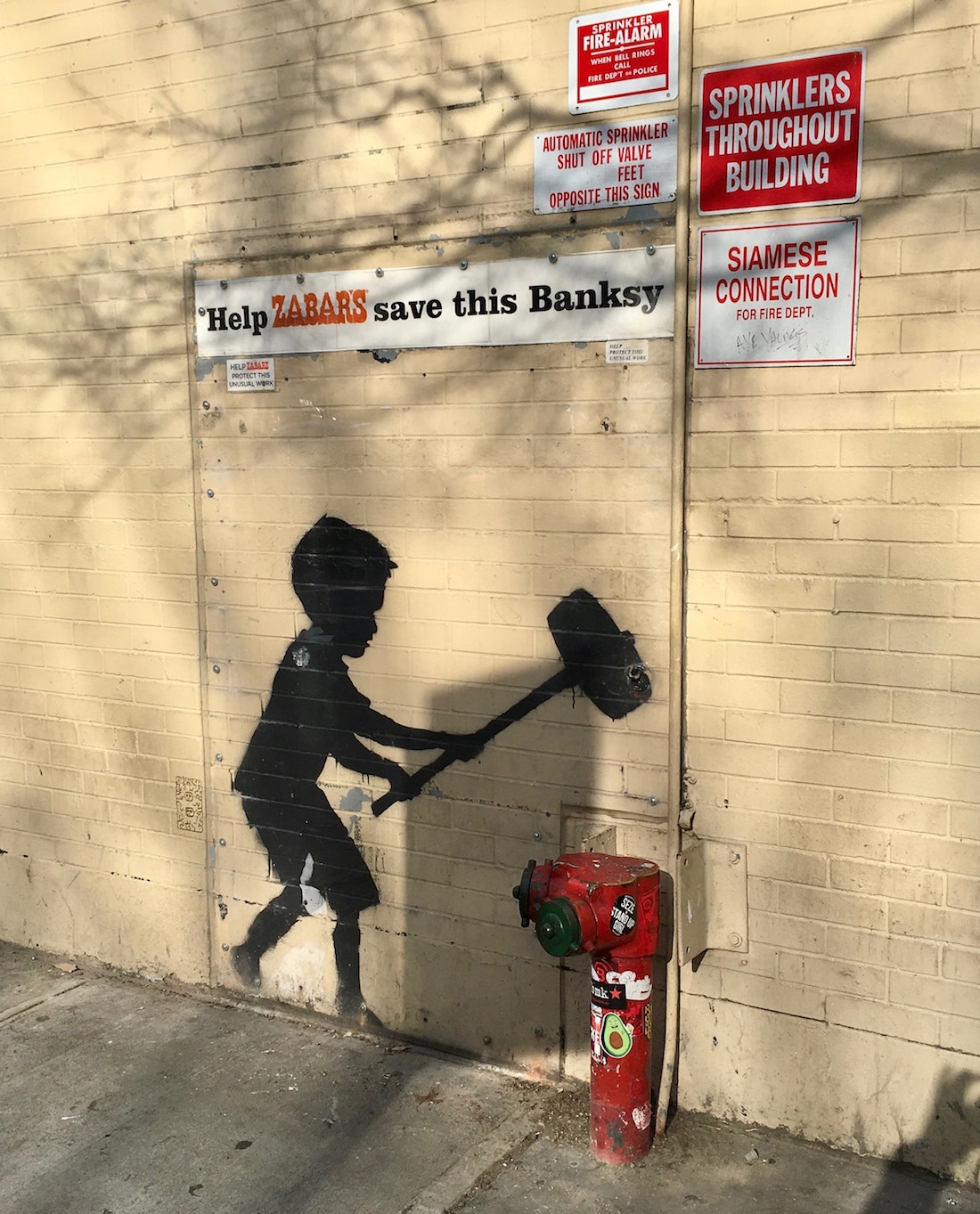 Banksy Hammer Boy NYC